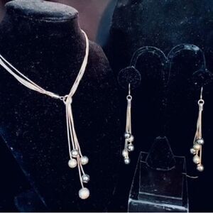Sterling Silver Unique Bolero Style Necklace and Matching Dangling Earrings.